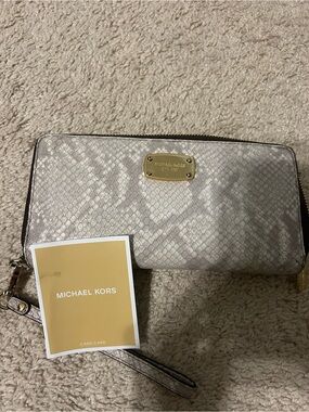 Michael Kors Metallic Silver-Tone Wristlet Clutch with Gold Plaque